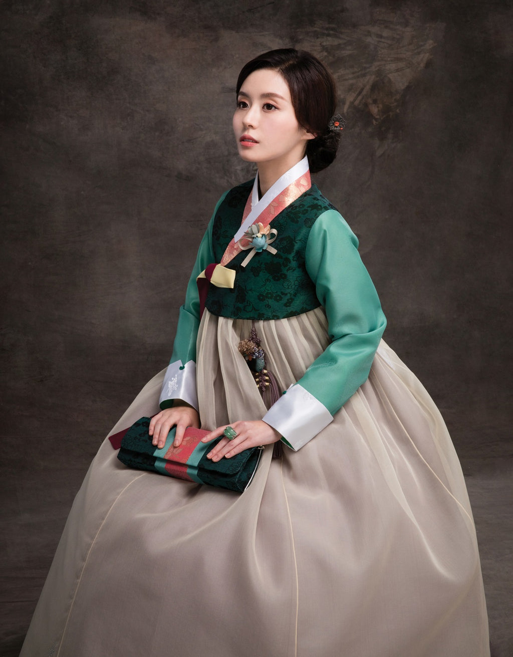 green jacket and gray skirt
